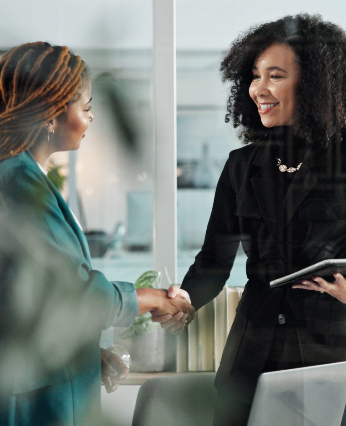 Handshake, meeting and business women in office with tablet for interview, hiring and job promotion.